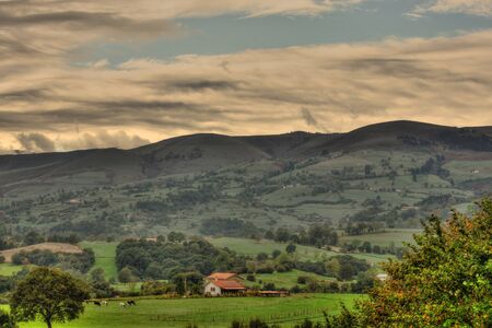 Cloudy valley in the northern Spanish countrysideの写真素材