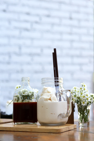 Milk smoothie and bottle thai teaの写真素材