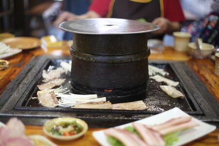 Traditional BBQ and hotpot Restaurant in Lijiang Yunanの写真素材