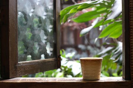 Relax with hot tea at the gradenの写真素材