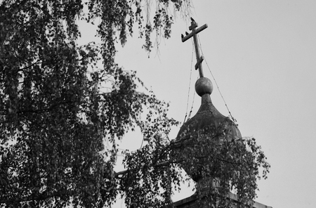 Crooked cross the abandoned old Churchの写真素材