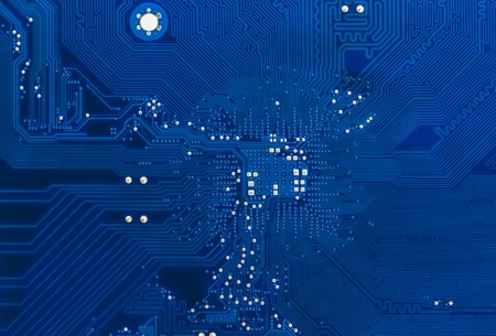 Blue circuit board background of computer motherboardの写真素材