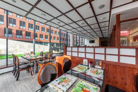 MOSCOW - JULY 2013: The interior is modern Japanese restaurant Ichiban Boshi. The main hall with panoramic windowのeditorial素材