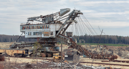 Many buckets of giant quarry excavator Equipment for the extraction of sand from the quarry.の写真素材