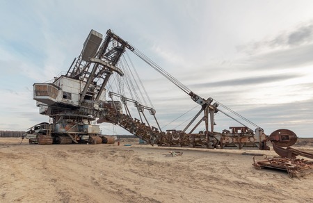 Many buckets of giant quarry excavator Equipment for the extraction of sand from the quarry.の写真素材