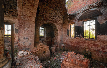 The brick ruins of the interior of an abandoned temple. Dilapidated vaultの写真素材