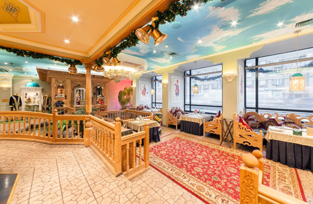 MOSCOW/RUSSIA - DECEMBER 2014. The interior of the deluxe restaurant of Uzbek cuisine - Babay Club in an oriental style.のeditorial素材
