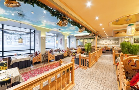 MOSCOW/RUSSIA - DECEMBER 2014. The interior of the deluxe restaurant of Uzbek cuisine - Babay Club in an oriental style.のeditorial素材