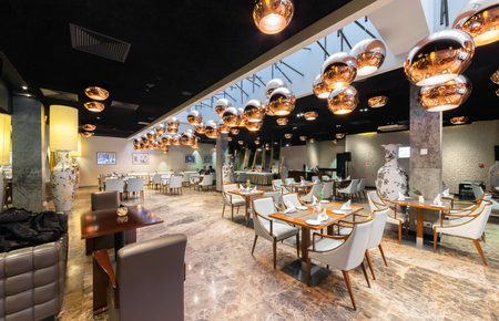 MOSCOW/RUSSIA - JANUARY 2015. Modern interior of a luxury steak restaurant "MEAT and MORE" in the center of Moscow. European and Russian cuisineのeditorial素材