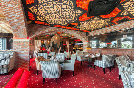 MOSCOW - AUGUST 2014: The Interior oriental restaurant "URYUK". The main dining room decorated in oriental styleのeditorial素材