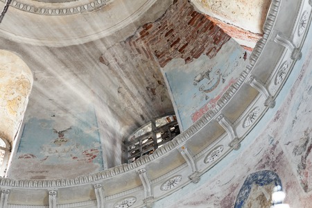 Sunlight from the window of an abandoned temple under the domeの写真素材