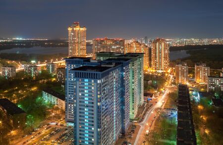 The view from the height on high-rise building on the outskirts of Moscow, in the night on the background of the riverの写真素材
