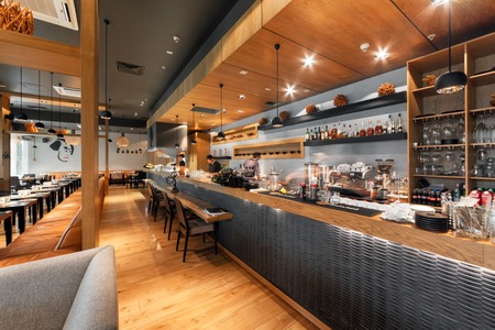 MOSCOW - AUGUST 2014: Interior of a Japanese restaurant bar and lounge "KABUKI". Large modern open kitchen in the main hallのeditorial素材