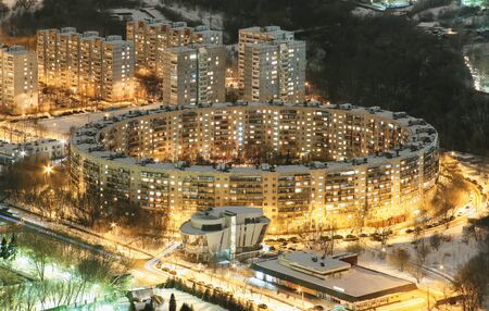 Residential apartment building in the form of a ring in Moscow at night. View from aboveの写真素材