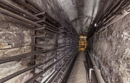 Old underground utility vault. Subway communication linesの写真素材