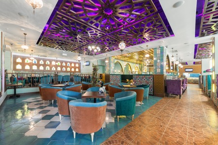 MOSCOW - AUGUST 2014: Interior Asian restaurant "Chayhana Izum". The main dining room is decorated in oriental styleのeditorial素材