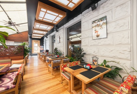 MOSCOW - AUGUST 2014: Interior of the Japanese restaurant "SEIJI" in the traditional style. Covered veranda with tables.のeditorial素材