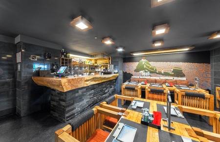 MOSCOW - AUGUST 2014: Interior of the Japanese restaurant "SEIJI" in the traditional style. The bar counter made of solid woodのeditorial素材