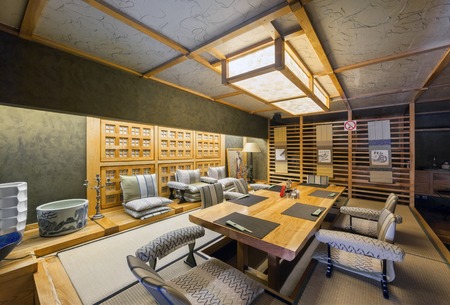 MOSCOW - AUGUST 2014: Interior of the Japanese restaurant "SEIJI" in the traditional style. VIP room is decorated in classical Japanese minimalism with a dining table with short legs and chairsのeditorial素材