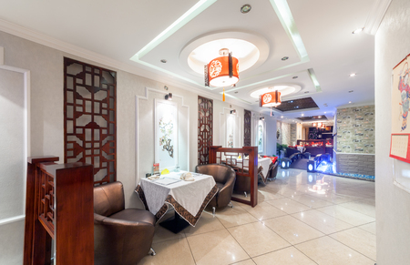 MOSCOW - AUGUST 2014: Interior of Chinese cuisine restaurant "HARBIN" in the traditional style.のeditorial素材