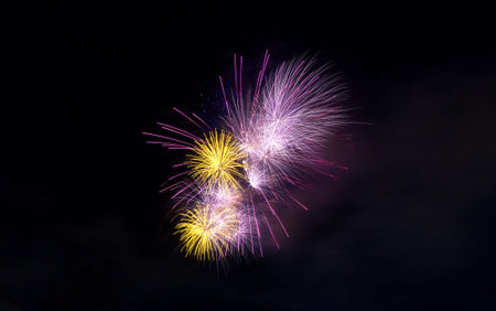 Fireworks light up close-up against dark sky