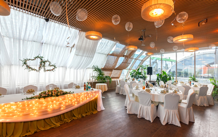MOSCOW - AUGUST 2014: Interior of a luxury disco bar restaurant with a banquet hall and cafeteria - "BrownBar". Banquet room prepared and decorated for the weddingのeditorial素材