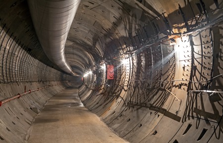 Construction of the underground metro tunnel. Turn the tunnelの写真素材