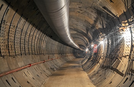 Construction of the underground metro tunnel. Turn the tunnelの写真素材