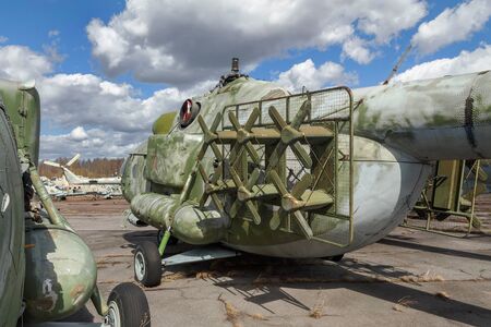 Old broken russian heavy transport helicopter an abandoned aerodromeの写真素材