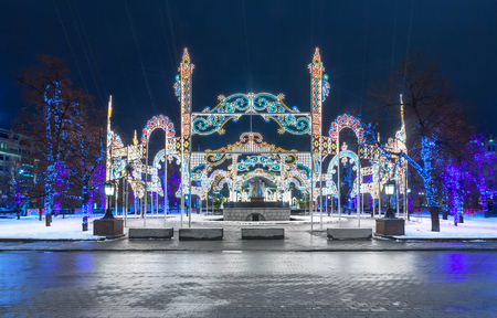 Decorating the streets of the city and trees with light decorations for Christmas and New Yearの写真素材
