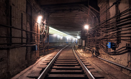 Passing train in the underground metro tunnel