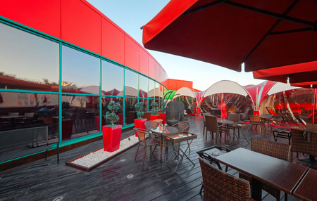 MOSCOW - SEPTEMBER 2014: The design of the stylish and modern interior of the Japanese restaurant "Tokyo Bay". Open veranda on the roofのeditorial素材