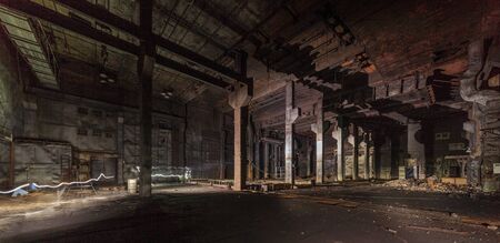 Giant abandoned after a fire in an old industrial laboratoryの写真素材