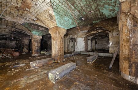 Interior of an abandoned underground wine warehouse of the 19th centuryの写真素材