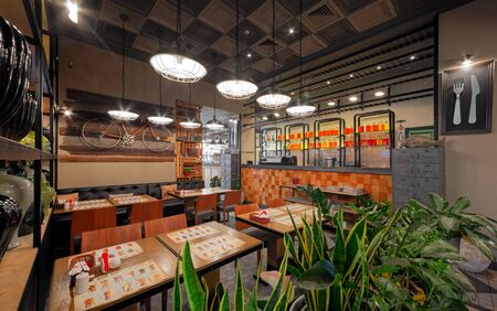 MOSCOW - OCTOBER 2014: The interior of the trendy restaurant "Oki Doki". Stylishly designed room without visitorsのeditorial素材
