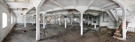 Panorama of the interior of the factory premises on an old abandoned breweryの写真素材