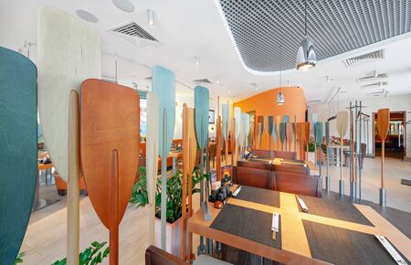 MOSCOW - SEPTEMBER 2014: The interior of the popular Japanese chain of restaurants in modern style "YAKITORIYA" in Moscow. The hall is decorated in a nautical themeのeditorial素材