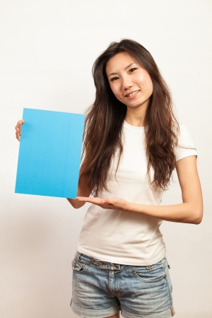 Blank card, Young woman holding card that can be replace with everything you want, namecard sign etc... shoot on isolated white backgroundの写真素材