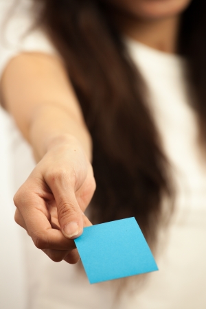 Blank card, Young woman holding card that can be replace with everything you want, namecard sign etc... shoot on isolated white backgroundの写真素材