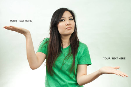 Asian woman in green set, weight good and badの写真素材