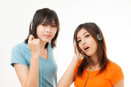Young Asian woman with a audiophile Headphoneの写真素材