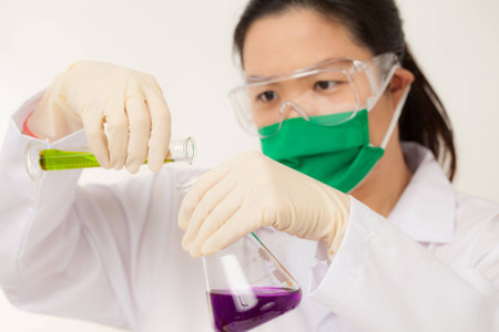Asian Researcher working with chemicalsの写真素材