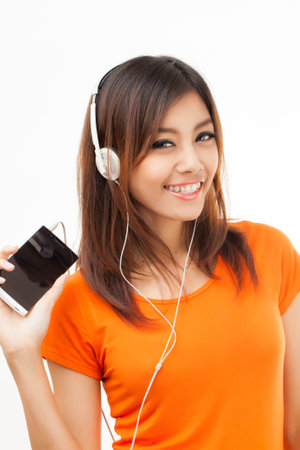 Young Asian woman with a audiophile Headphoneの写真素材