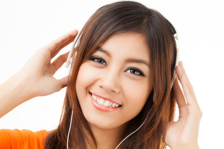Young Asian woman with a audiophile Headphoneの写真素材