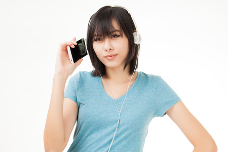 Young Asian woman with a audiophile Headphoneの写真素材