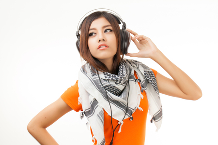 Young Asian woman with a audiophile Headphoneの写真素材