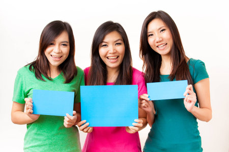Blank card, people holding card that can be replace with everything you want, name card sign etc    shoot on isolated white backgroundの写真素材