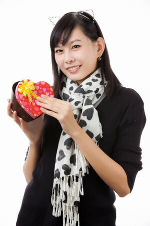 asian woman valentines day giving and receiving giftの写真素材