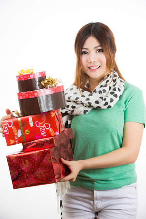 asian woman valentines day giving and receiving giftの写真素材
