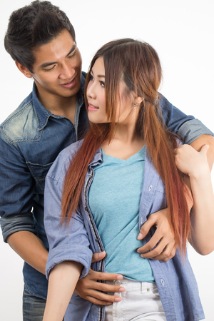 happy young couple shooting in studioの写真素材